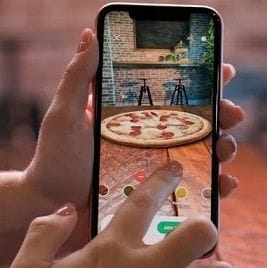"Very early entry" with AR takes Domino's into uncharted food retail territory "Very early entry" with AR takes Domino's into uncharted food retail territory